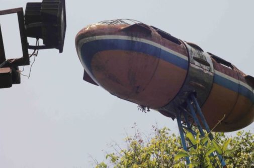 image of rocket at the yangon abandoned amusement park.