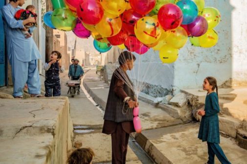 balloon seller photographic print by james longley